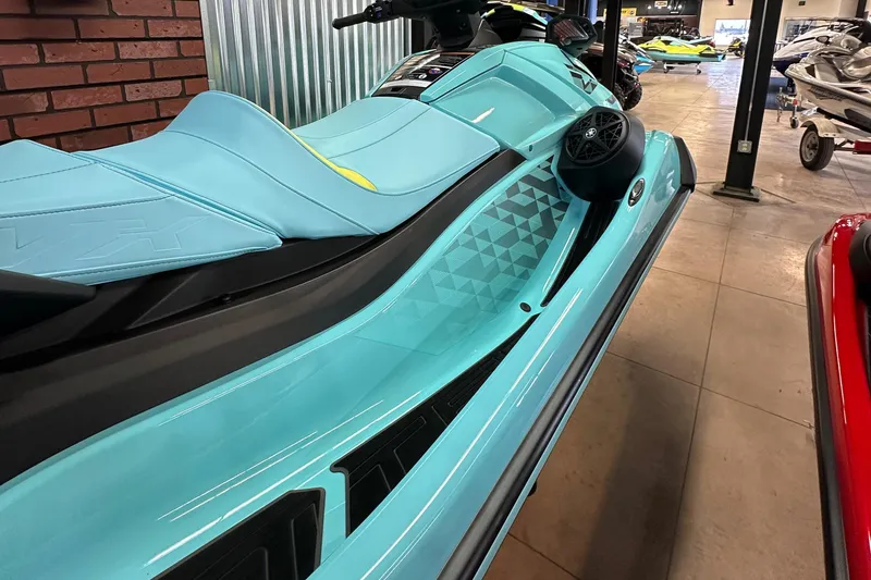 Slide: The Image of 2025 Yamaha WaveRunner VX Limited Ho in showroom, featuring sleek turquoise design. - 6
