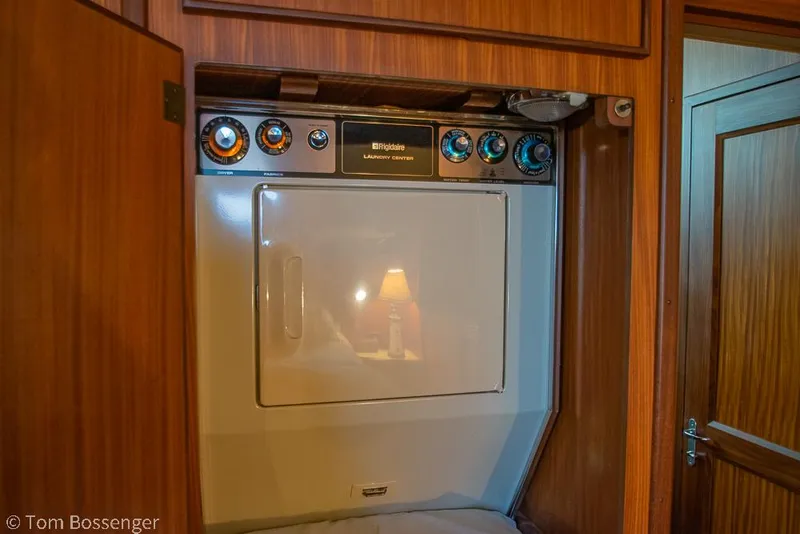 Slide: The Image of Built-in dryer in 1986 Hatteras 43 Motor Yacht, wooden cabinetry, compact design. - 30