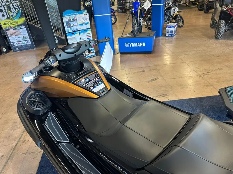 Slide: The Image of 2025 Yamaha WaveRunner FX Cruiser HO in showroom, featuring sleek design and advanced controls. - 9
