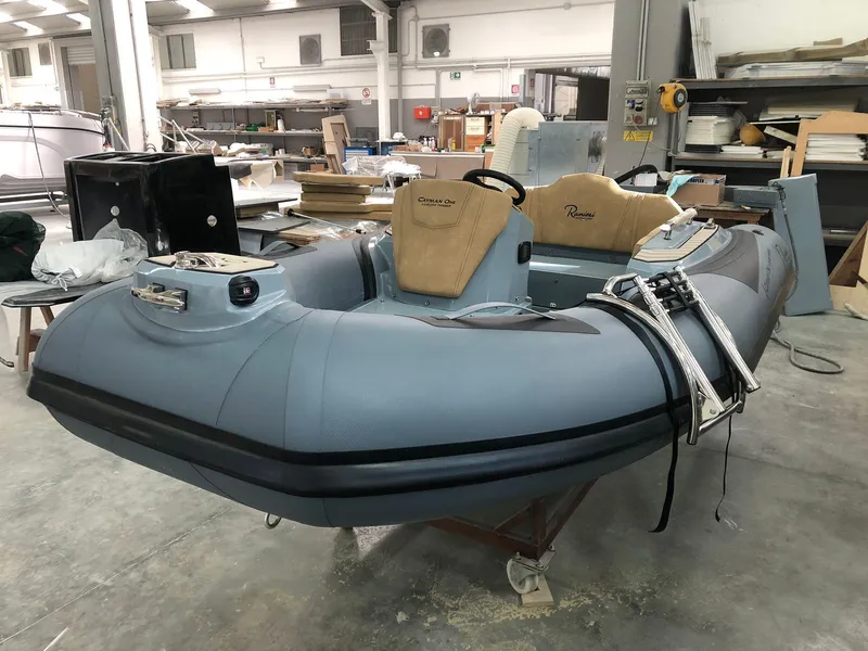 Slide: The Image of 2025 Ranieri CAYMAN ONE LUXURY TENDER in a workshop setting. - 6