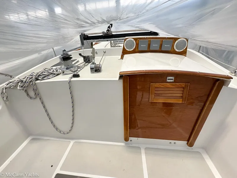 Slide: The Image of 1988 Bristol 41.1 Aft Cockpit sailboat interior with wooden hatch and control panel. - 13