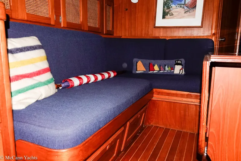 Slide: The Image of Cozy interior of 1988 Bristol 41.1 Aft Cockpit yacht with blue seating and nautical decor. - 27