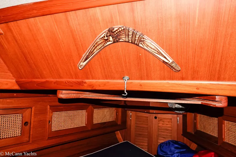 Slide: The Image of Interior of 1988 Bristol 41.1 Aft Cockpit yacht with wooden finish and decorative boomerang. - 31