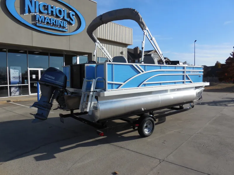 Slide: The Image of 2025 Bennington 188 SF pontoon boat at Nichols Marine dealership. - 3