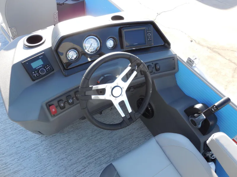 Slide: The Image of 2025 Bennington 188 SF boat dashboard with steering wheel and control panel. - 7