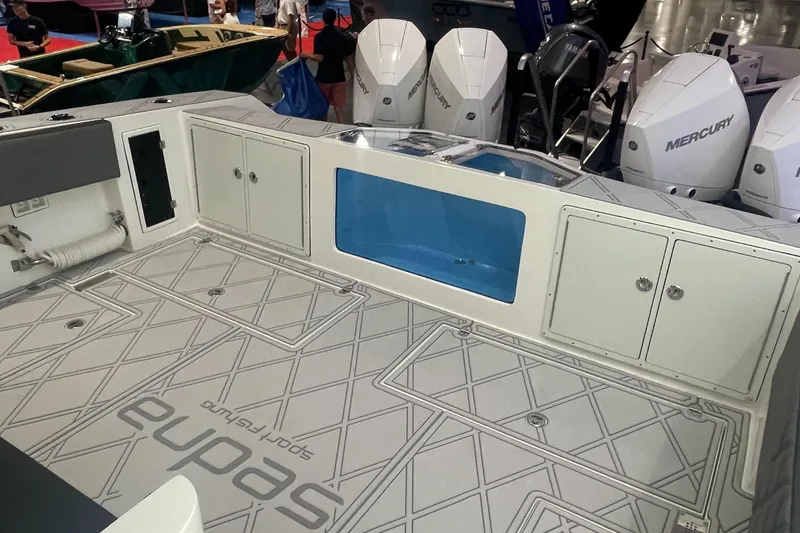 Slide: The Image of 2024 Sedna 370 Open boat interior with storage and Mercury engines. - 10