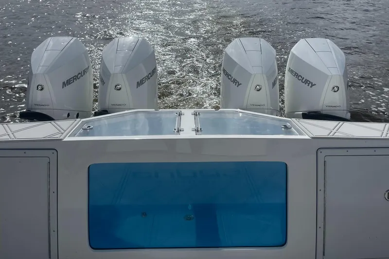 Slide: The Image of 2024 Sedna 370 Open boat with four Mercury outboard engines on water. - 11