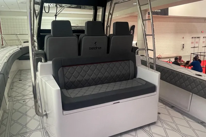 Slide: The Image of 2024 Sedna 370 Open boat interior with modern seating and sleek design. - 4
