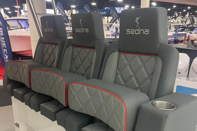 Slide: The Image of 2024 Sedna 370 Open luxury boat seats with diamond stitching and cup holder. - 6