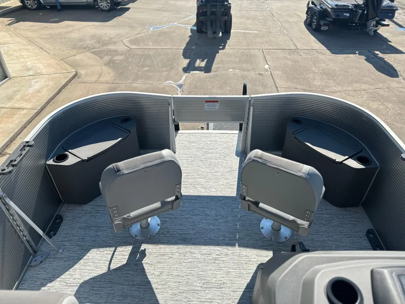 Slide: The Image of 2025 Bennington 188 SF boat interior with seating and storage compartments. - 6