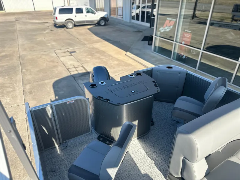 Slide: The Image of 2025 Bennington 188 SF pontoon boat interior with seating and control console. - 8