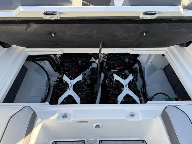 Slide: The Image of 2025 Yamaha Boats AR250 engine compartment with dual engines visible. - 13