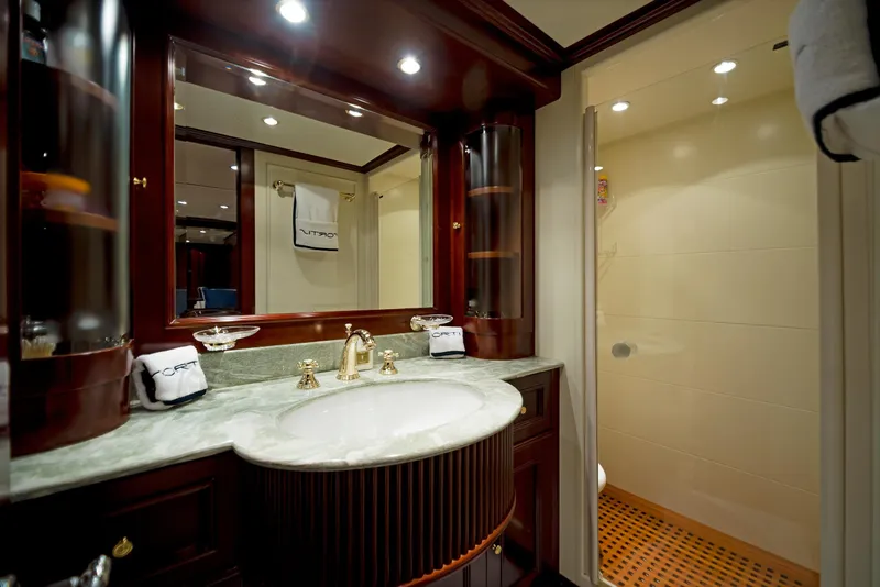 Slide: The Image of Luxurious bathroom on 2003 Benetti 115 Classic yacht with elegant fixtures and spacious shower. - 18