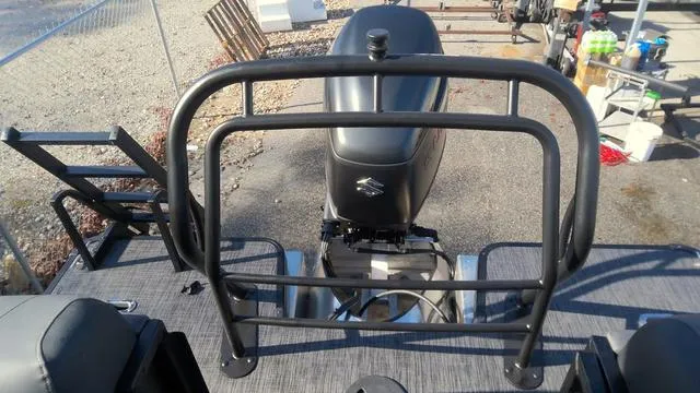 Slide: The Image of 2025 Godfrey Sweetwater 2286 SB GTP pontoon boat with Suzuki outboard motor. - 23