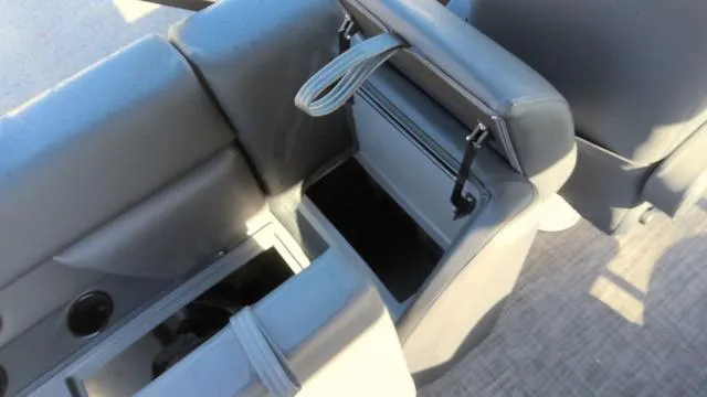 Slide: The Image of Godfrey Pontoons Sweetwater 2286 SB 2025, open storage compartment, gray seating. - 30