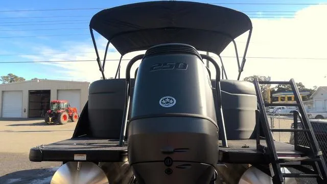 Slide: The Image of 2025 Godfrey Pontoons Sweetwater 2286 SB interior with gray seating and carpet flooring. - 4