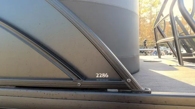 Slide: The Image of Control panel of 2025 Godfrey Sweetwater 2286 SB GTP pontoon boat with safety features. - 7