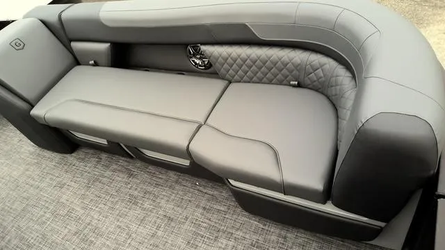 Slide: The Image of 2025 Godfrey Pontoons Sweetwater 2286 SB interior with gray seating and carpeted flooring. - 9