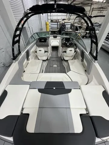 Slide: The Image of 2022 Chaparral 23 SSi boat interior with gray and white seating. - 5