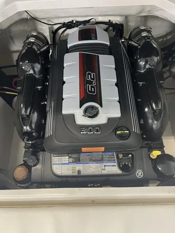 Slide: The Image of 2022 Chaparral 23 SSi boat dashboard with steering wheel and gauges. - 7