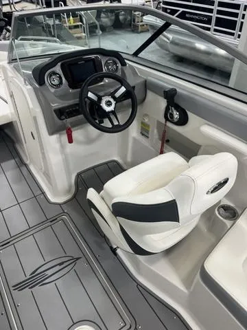Slide: The Image of 2022 Chaparral 23 SSi boat interior with sleek seating and modern design. - 9