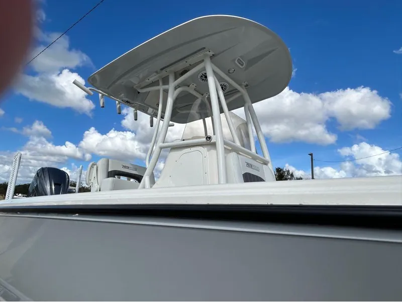 Slide: The Image of 2025 Pathfinder 2700 Open boat against a blue sky with clouds. - 10