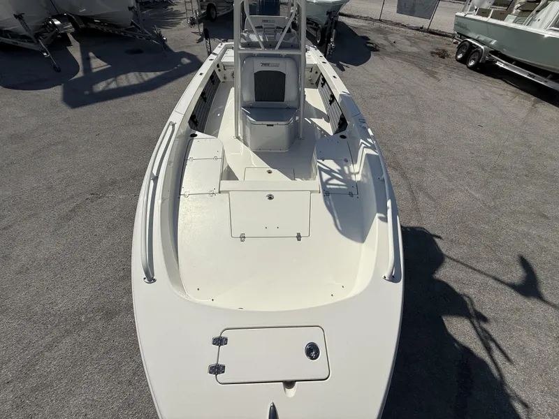 Slide: The Image of 2025 Pathfinder 2600 TRS boat, top view, parked on concrete surface. - 35