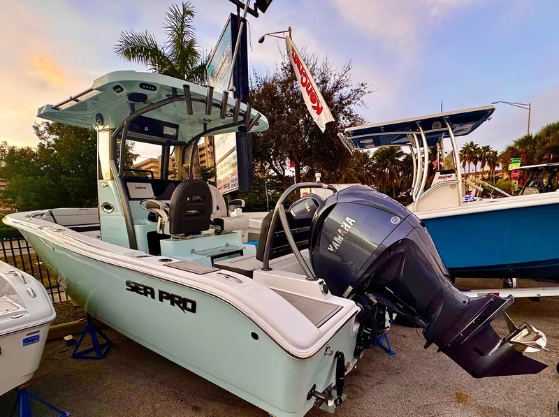 Slide: The Image of 2025 Sea Pro 245 FLX boat seat, white and black design. - 8