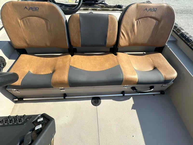 Slide: The Image of 2024 Avid 18SC Rogue boat seats with brown and gray upholstery. - 14