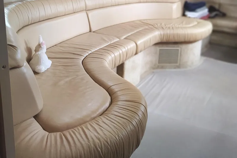 Slide: The Image of Luxurious leather seating in 2001 Sea Ray Sundancer yacht interior. - 29