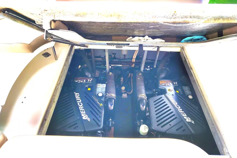 Slide: The Image of Engine compartment of 2001 Sea Ray Sundancer with twin Mercury engines. - 35