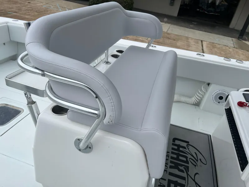 Slide: The Image of 2021 Contender 39 ST boat with cushioned seating and stainless steel frame. - 16