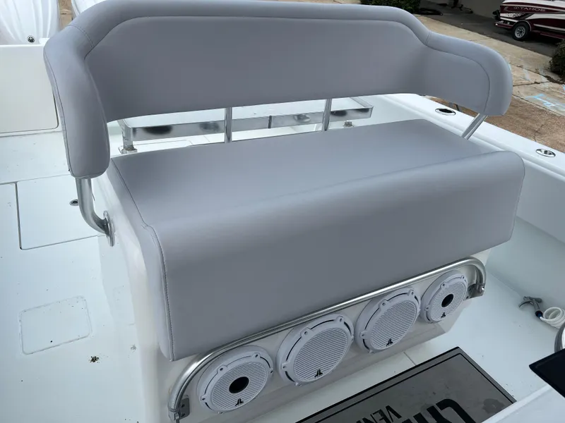 Slide: The Image of Contender 39 ST 2021 boat seat with integrated speakers, gray upholstery. - 23