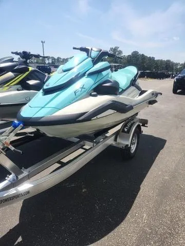 Slide: The Image of 2025 Yamaha WaveRunner FX Cruiser HO, sleek design, turquoise and gray color scheme. - 1