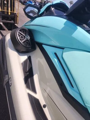 Slide: The Image of 2025 Yamaha WaveRunner FX Cruiser HO in light blue and white, close-up view. - 6