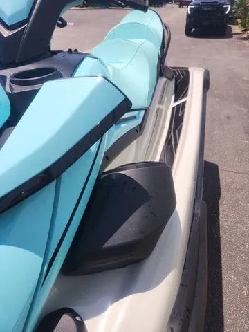 Slide: The Image of 2025 Yamaha WaveRunner FX Cruiser HO in light blue, parked outdoors. - 9