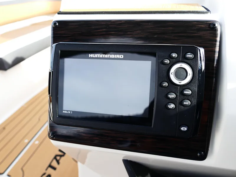 Slide: The Image of Humminbird Helix fish finder on 2025 Starcraft SVX 211 OB boat dashboard. - 16