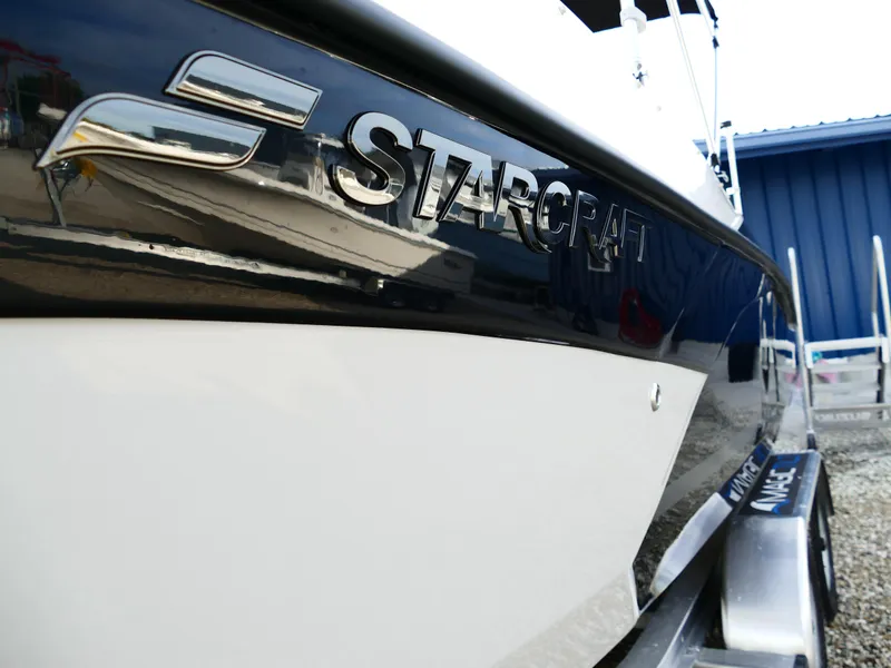Slide: The Image of Close-up of 2025 Starcraft SVX 211 OB boat on trailer. - 4