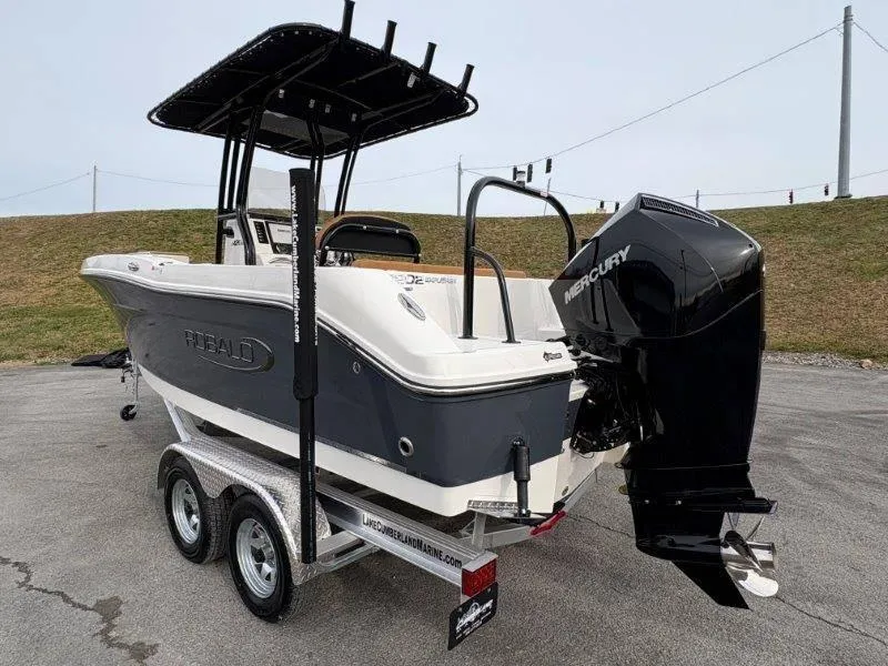Slide: The Image of 2025 Robalo 202 EXPLORER boat on trailer with Mercury outboard engine. - 2