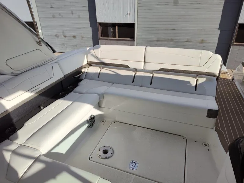 Slide: The Image of 2018 Formula 350 Crossover Bowrider interior with spacious seating and sleek design. - 14