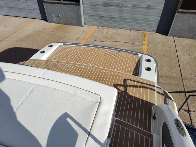 Slide: The Image of 2018 Formula 350 Crossover Bowrider with spacious deck and sleek design. - 16