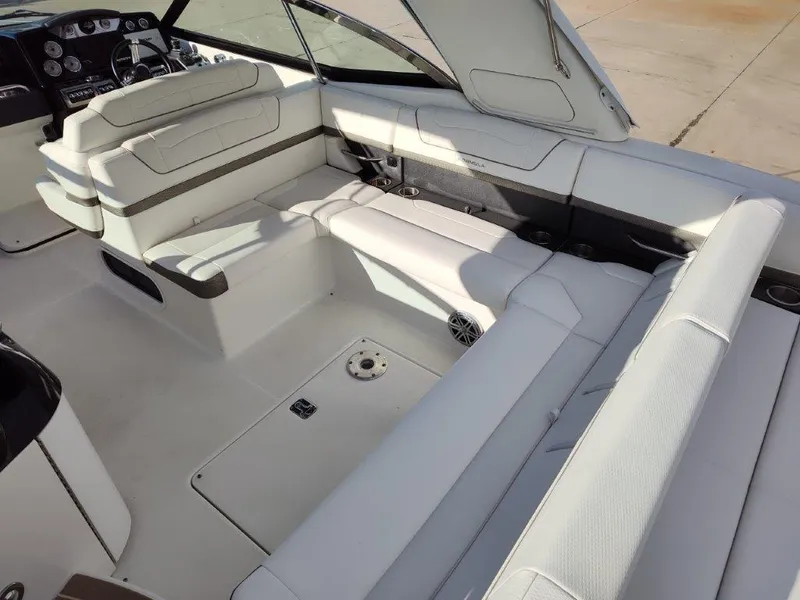 Slide: The Image of 2018 Formula 350 Crossover Bowrider interior with white seating and dashboard view. - 17