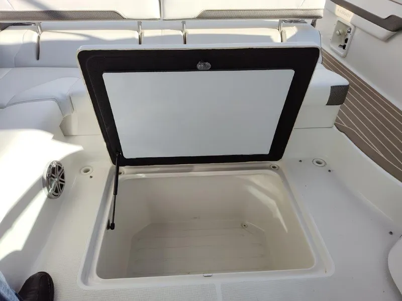 Slide: The Image of Open storage compartment on 2018 Formula 350 Crossover Bowrider boat interior. - 20