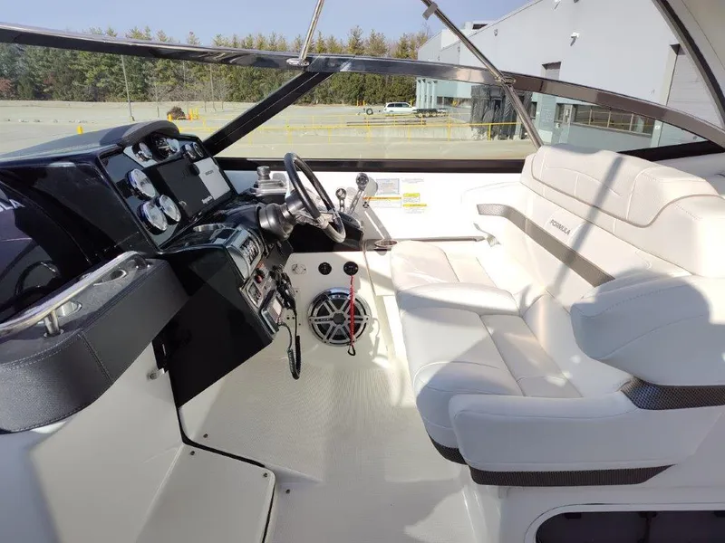 Slide: The Image of 2018 Formula 350 Crossover Bowrider interior with sleek dashboard and comfortable seating. - 22