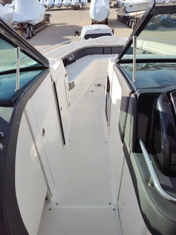 Slide: The Image of 2018 Formula 350 Crossover Bowrider, sleek deck view, luxury boating experience. - 24