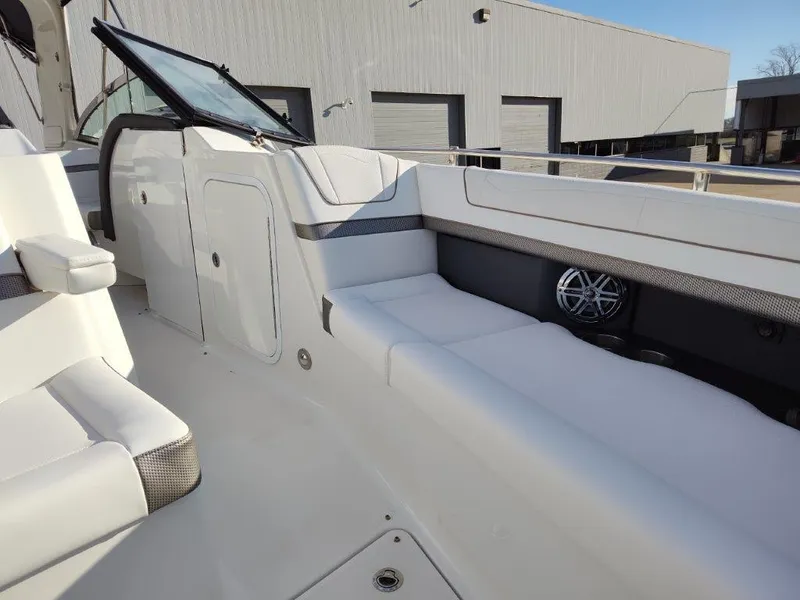 Slide: The Image of 2018 Formula 350 Crossover Bowrider interior with white seating and modern design. - 27