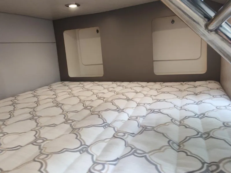 Slide: The Image of Interior cabin of 2018 Formula 350 Crossover Bowrider with patterned bedding. - 37