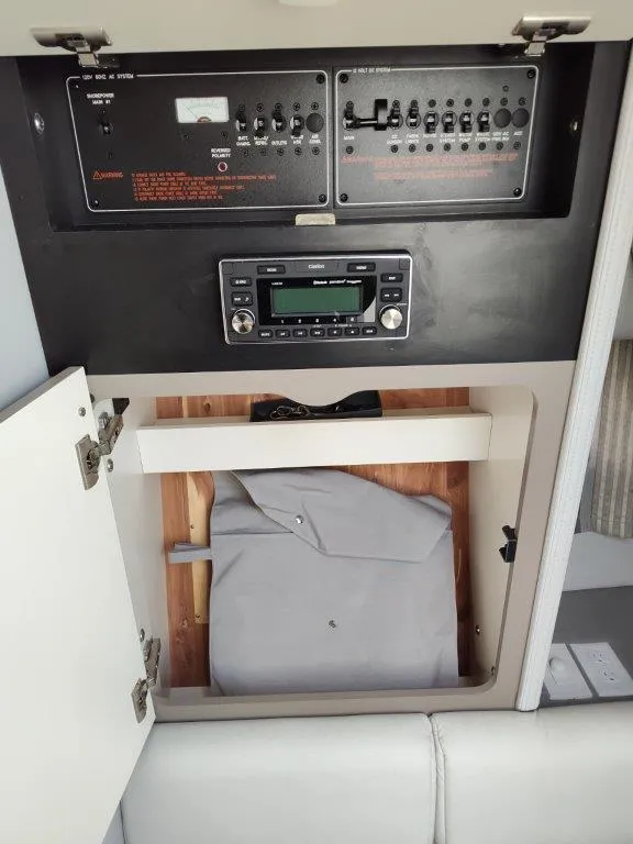 Slide: The Image of 2018 Formula 350 Crossover Bowrider control panel with storage compartment. - 42