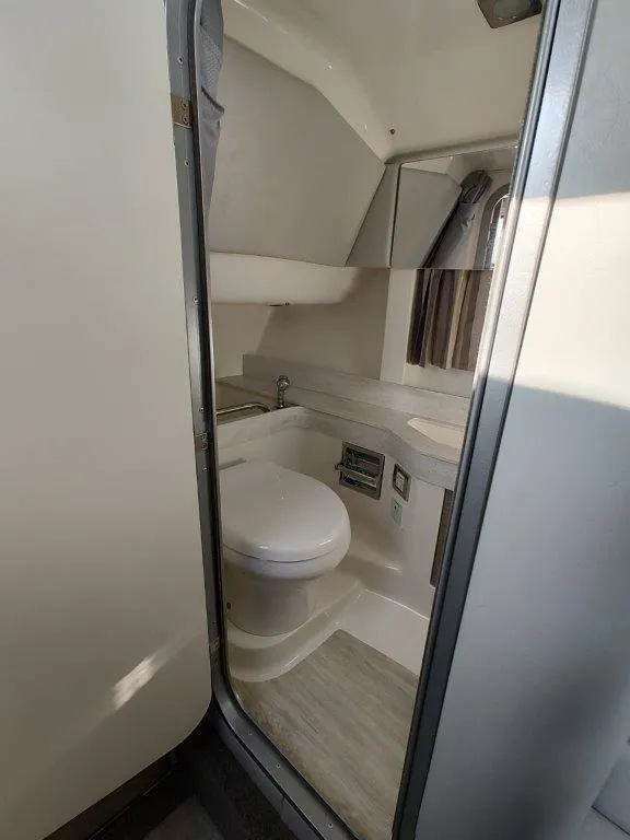 Slide: The Image of 2018 Formula 350 Crossover Bowrider bathroom interior with modern fixtures. - 44