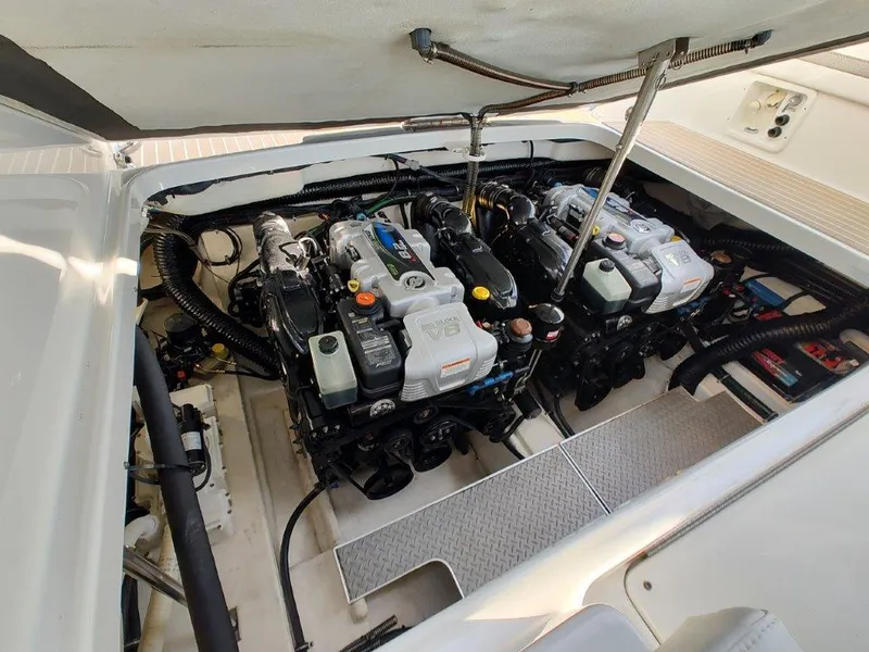 Slide: The Image of Engine compartment of 2018 Formula 350 Crossover Bowrider, showcasing dual engines. - 47